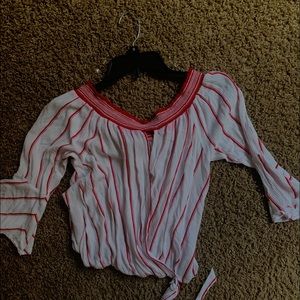 Off the shoulder, flowing blouse.